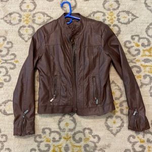Like new fitted faux leather motorcycle jacket. Fleece lined.